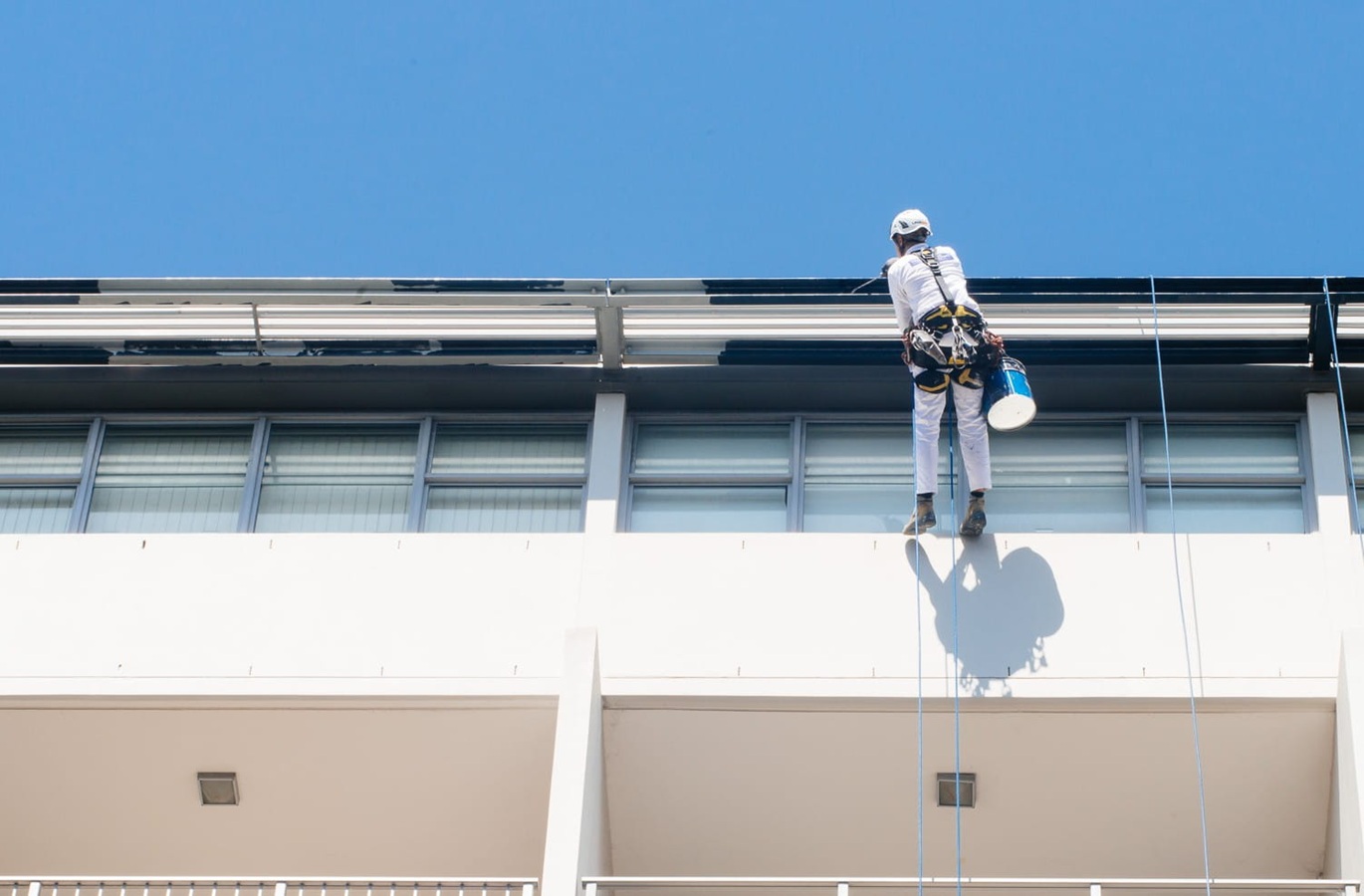 Rope access painting abseiling